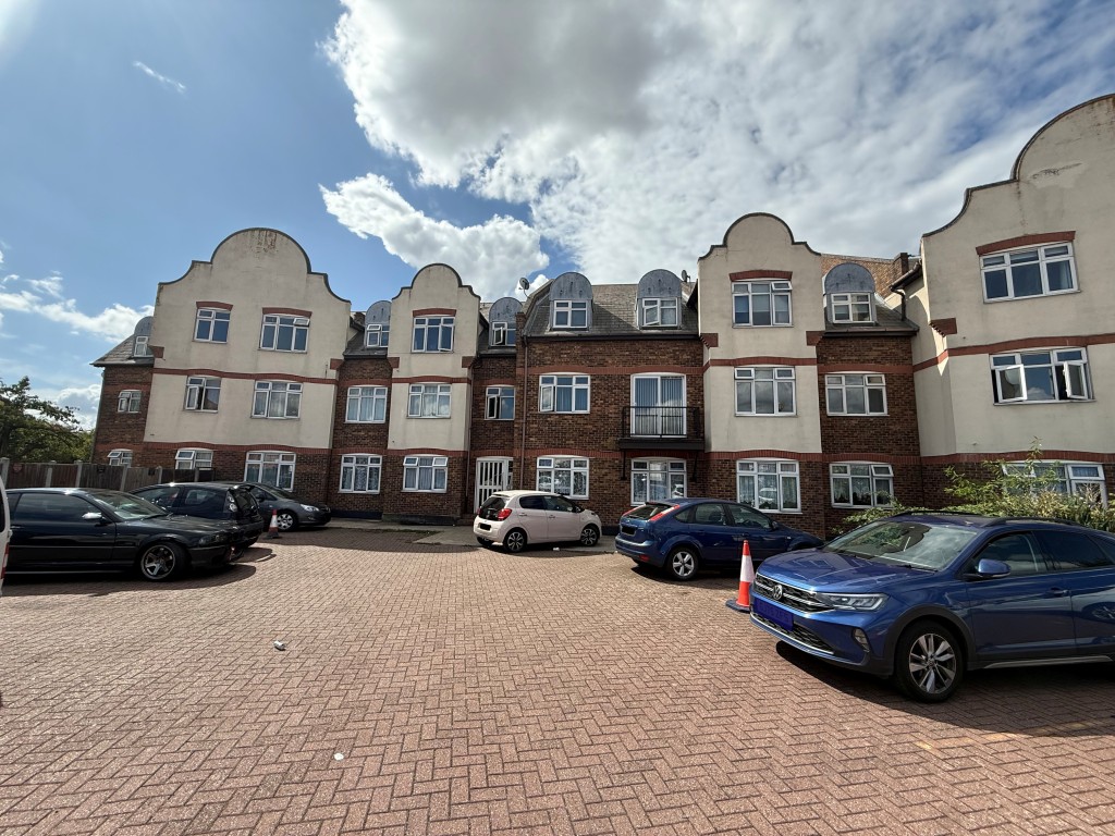 Lot: 219 - ONE-BEDROOM FLAT IN NEED OF MODERNISATION - Front elevation of property showing external entrance